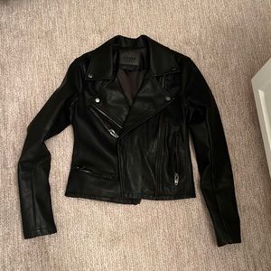 Looks new. Only wore once